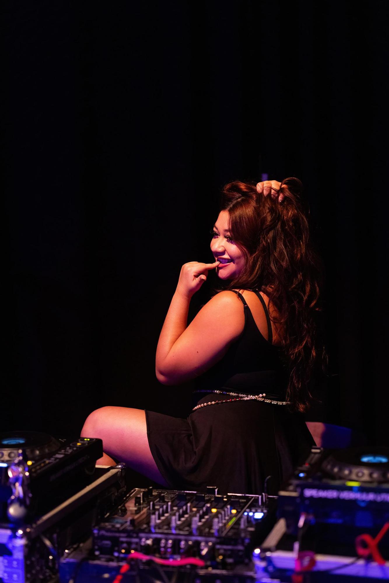 Miss Colombia on a DJ table